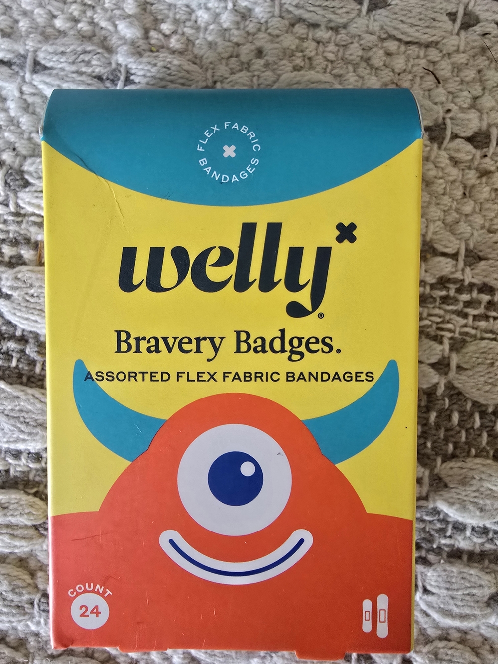 Welly Assorted Kids Band-Aids Pack - Bright Yellow Box with Colorful Patterns